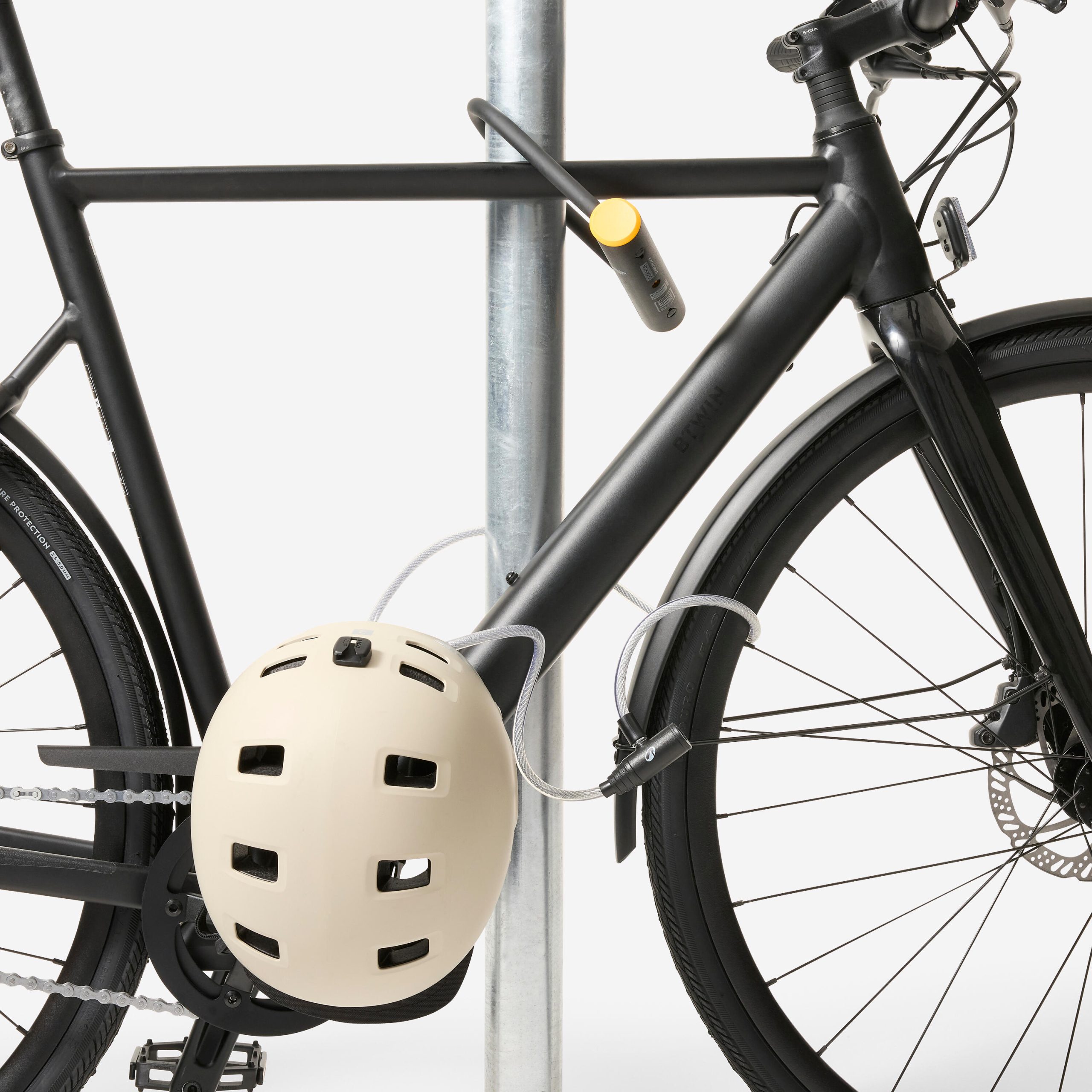 candado-bicicleta-decathlon-808ogq-1.jpg Candado Accesorios Bicicleta 100 Gris Llave - Imagen 1